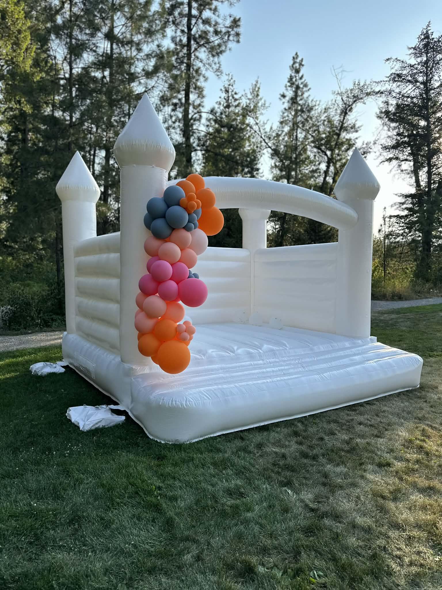 white bouncy castle rental Kelowna party setup